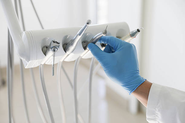Professional Root Canal Treatment technician working in Alamance County County, NC